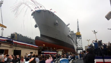 Military Sealift Command's newest ship, fleet replenishment oiler USNS Harvey Milk (T-AO 206), slides into the water during the christening ceremony at General Dynamic NASSCO, San Diego. The ship honors Navy veteran and LGBT activist Harvey Milk, one of the first openly gay candidates elected to public office as a member of the San Francisco Board of Supervisors in 1978.