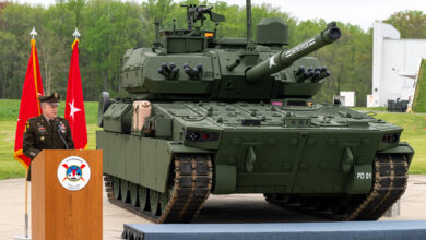 U.S. Army Brig. Gen. Geoffrey A. Norman the director of the Next Generation Combat Vehicle Cross Functional Team, gives his remarks on the M10 Booker Combat Vehicle during the M10 Booker Dedication Ceremony at Aberdeen Proving Ground, in Aberdeen, Md., April 18, 2024. The M10 Booker Combat Vehicle delivers overwhelming precision firepower to the Infantry Brigade, allowing it to maintain momentum and freedom of action against enemy forces. As part of the dedication of the M10 Booker Combat Vehicle in their name, U.S. Army Pvt. Robert D. Booker, a Medal of Honor recipient, and infantryman, assigned to the 133rd Infantry Regiment, 34th Infantry Division, during World War II, and Staff Sgt. Booker, a Distinguished Service Cross recipient, and tank crewman, assigned to Alpha Company, 1st Battalion, 64th Armor Regiment, 3rd Infantry Division, in support of Operation Iraqi Freedom, were recognized and honored for their ultimate sacrifice, heroism and commitment to service and country, represented by family members during the ceremony. (U.S. Army photo by Christopher Kaufmann)